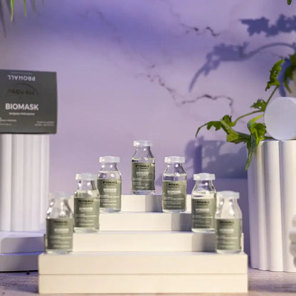 Biomask skincare products displayed on a staircase with a blurred background