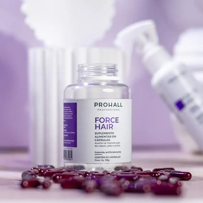 Prohall Force Hair supplement bottle with capsules on a blurred background