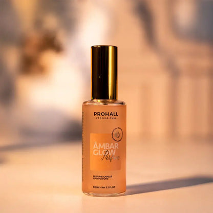 Prohall Ambar Glow perfume bottle on a blurred background