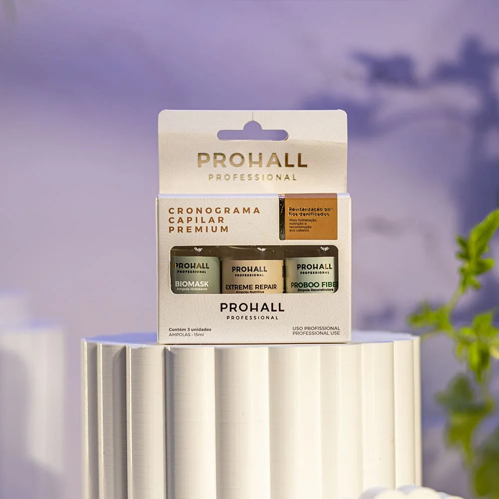 PROHALL hair care product packaging with a blurred nature background