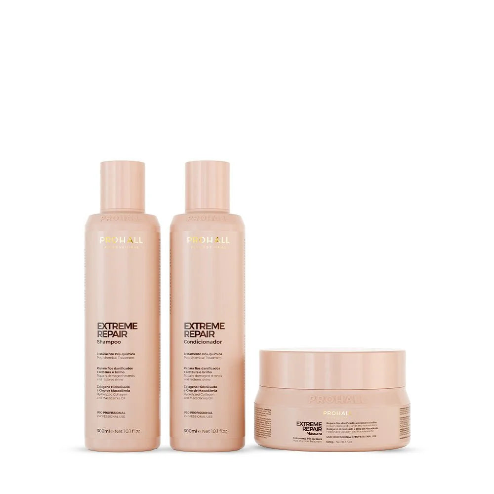 Three bottles and a jar of Redken Extreme Repair hair care products including shampoo, conditioner and mask on a white background. Kit for hair repair after chemical damage set
