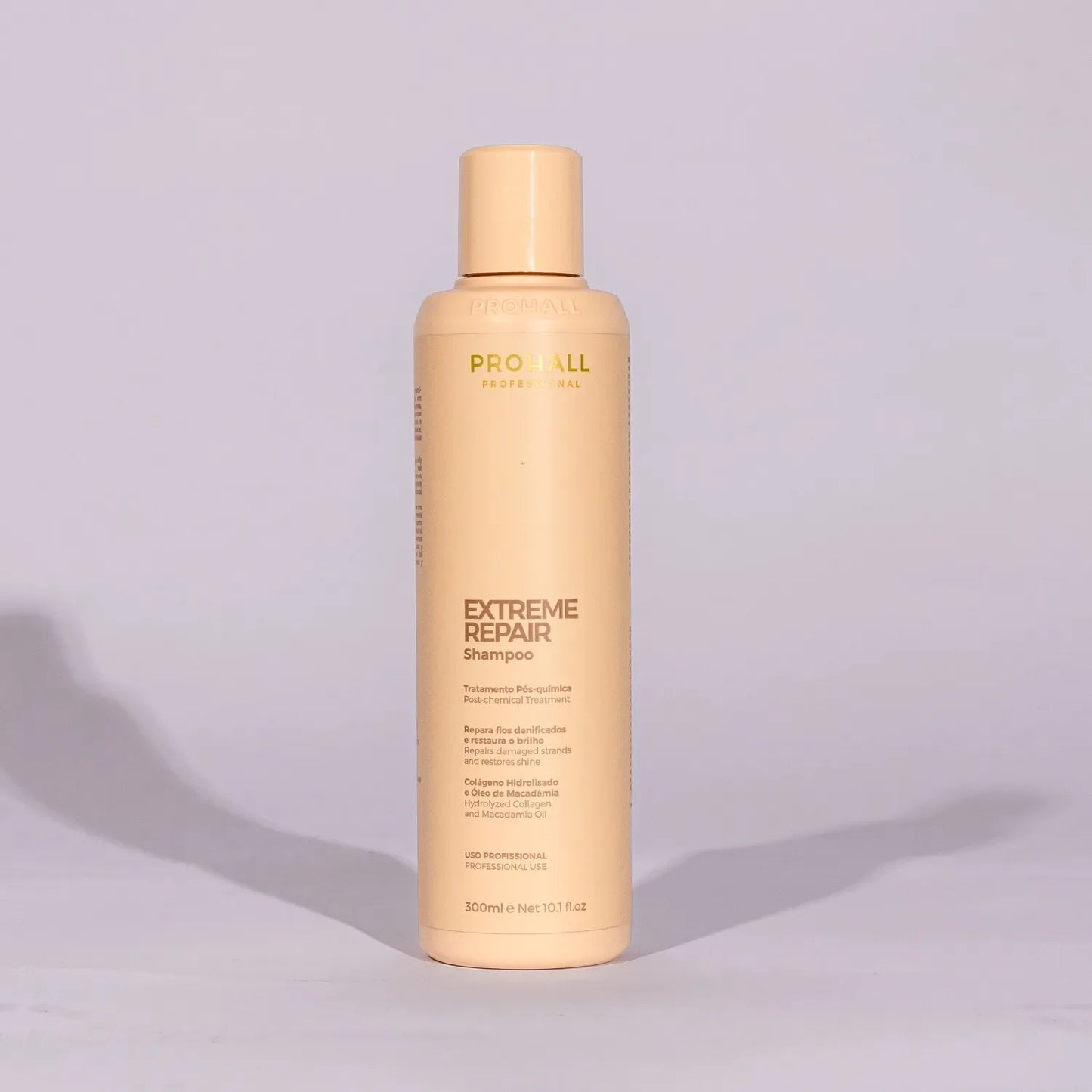 Shampoo bottle labeled 'Extreme Repair' on a light gray background