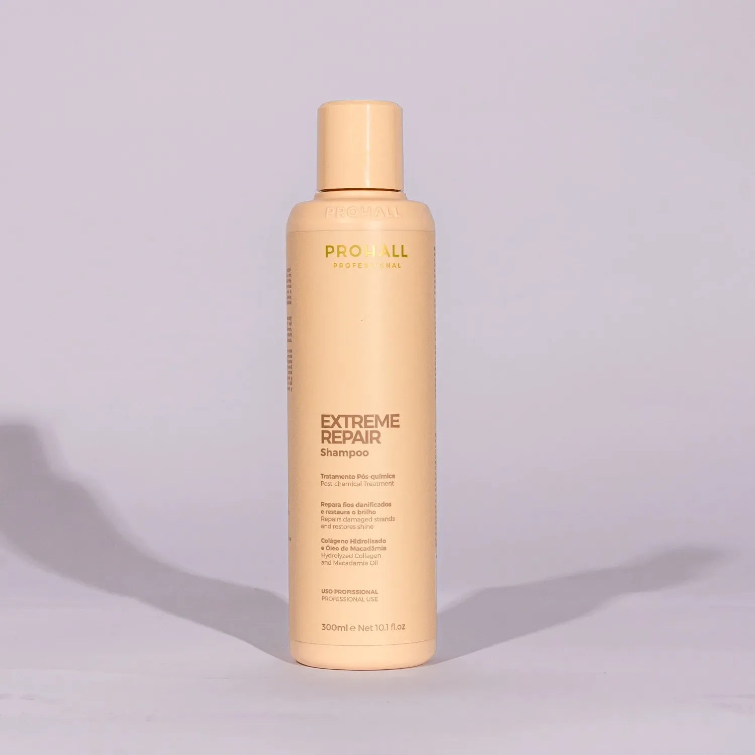 Shampoo bottle labeled 'Extreme Repair' on a light gray background