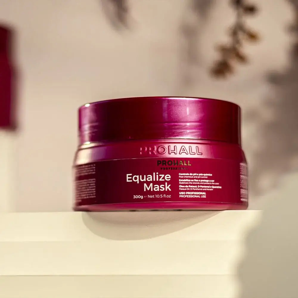 Red jar of Pro Hall Equalize Mask on a beige background