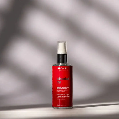 Red bottle with white spray nozzle on a gray background