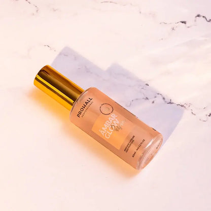 Prohall Amber Glow foundation bottle on a marble surface