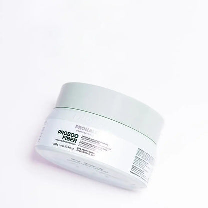 White jar of ProHair fiber on a white background