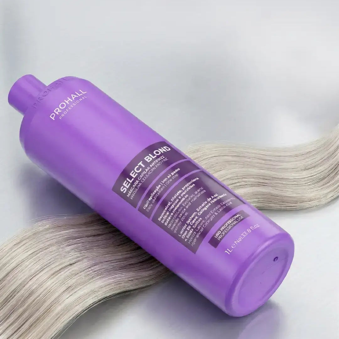 Purple bottle of Prosalon Select Blond hair product on a light gray background with blonde hair strands.