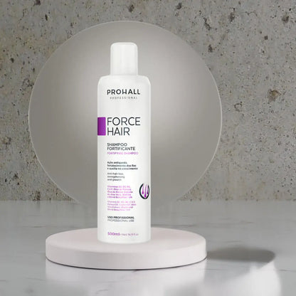 Prohall Force Hair shampoo bottle on a round white platform with a gray textured background