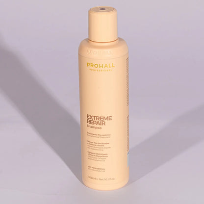 Prohall Extreme Repair shampoo bottle on a gradient background