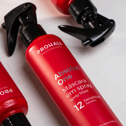 Red spray bottle with black nozzle labeled 'Prohall' on a light gray background